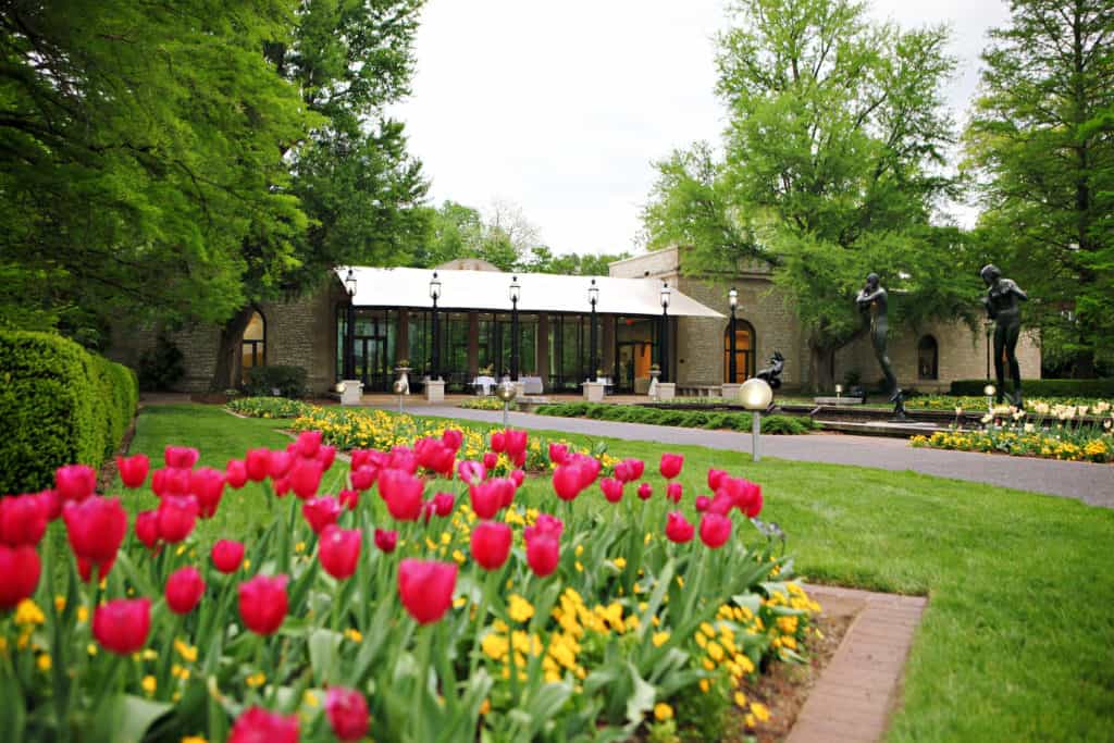 exterior shot of Spink building with roses in front