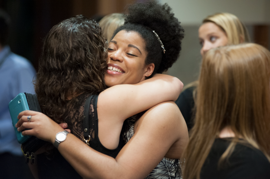 Class of 2010 at reunion hugging