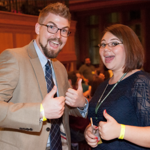 Class of 2010 at reunion giving thumbs up sign