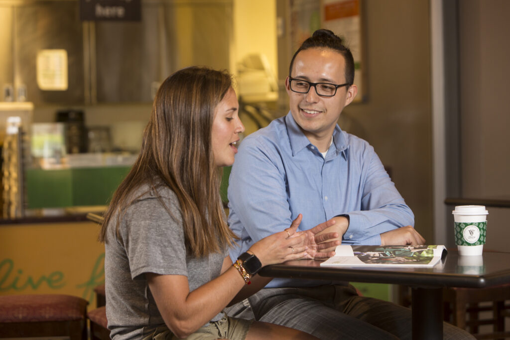 a student is being interviewed by an alum