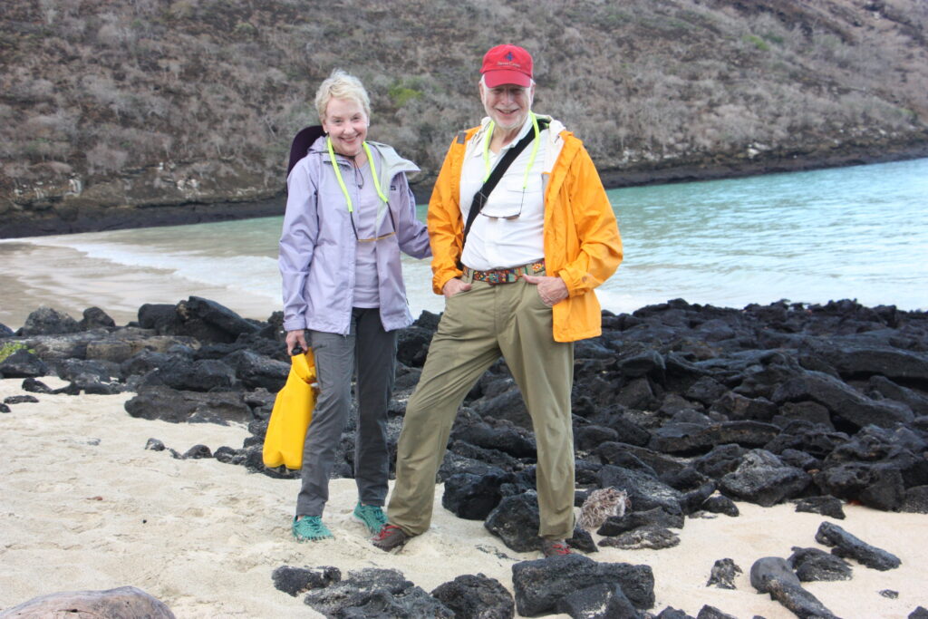 WashU alums walking on shore 