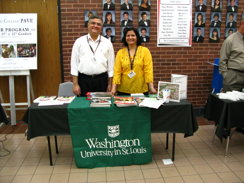 Parents at a high school college fair representing WashU