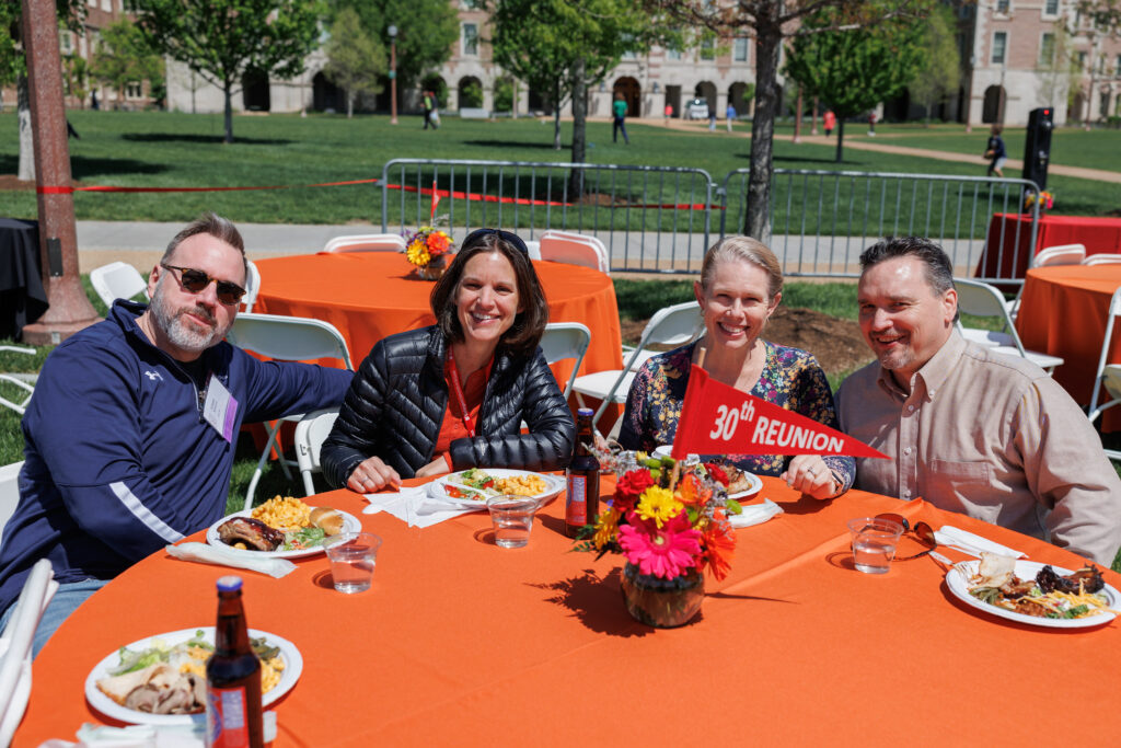 Four Class of 1994 alums at alumni BBQ