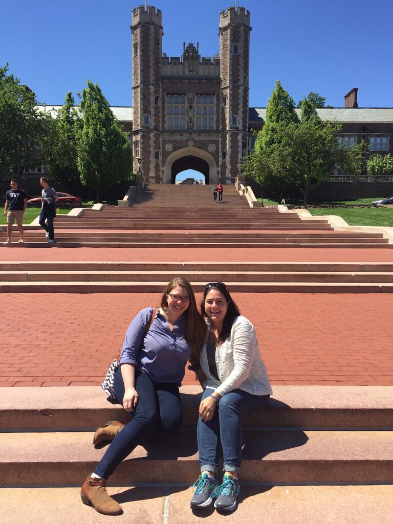 Kristen Haut and Julie Katz, both AB ’02, in front of Brookings Hall