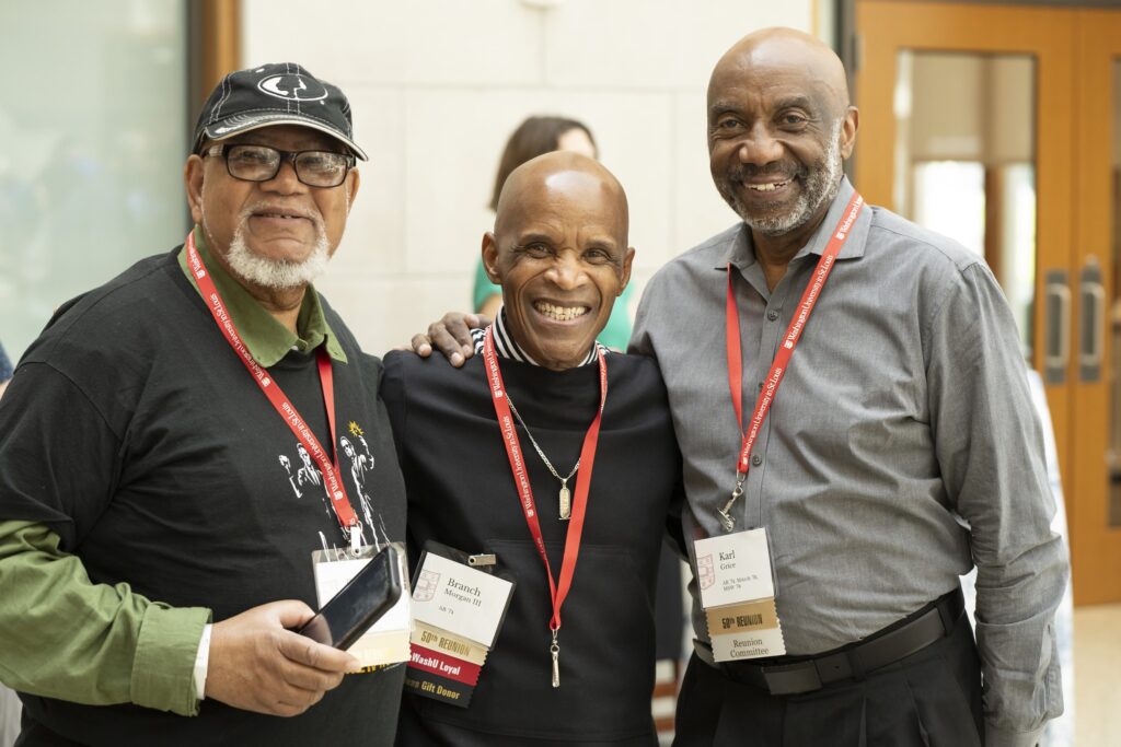 Three alums at a reunion dinner