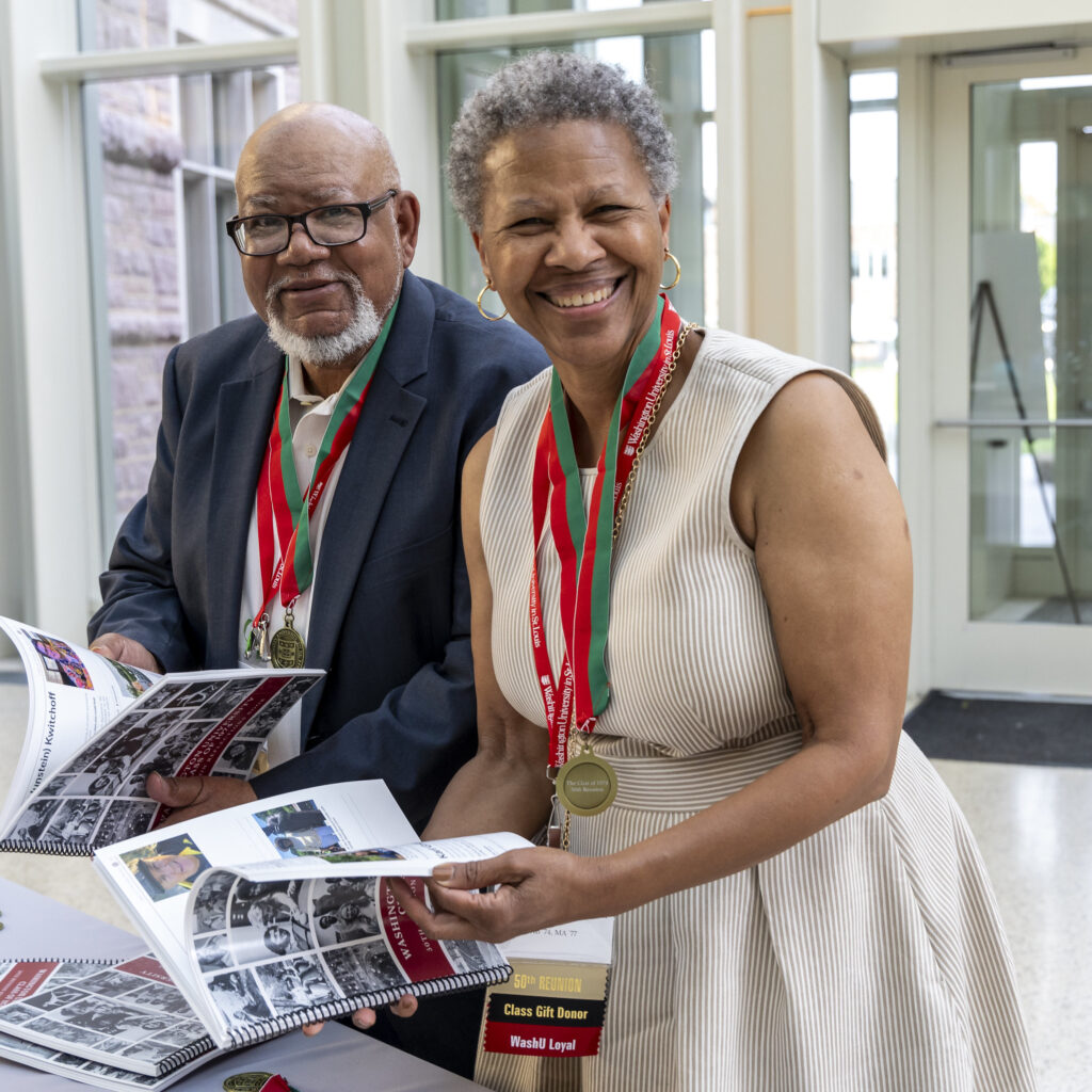 alums browse yearbooks