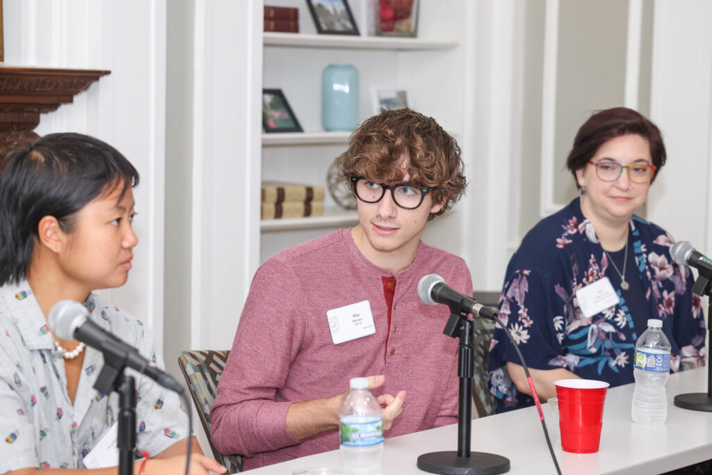 A panel answers questions during the WUpan turns 10 reception in October 2023