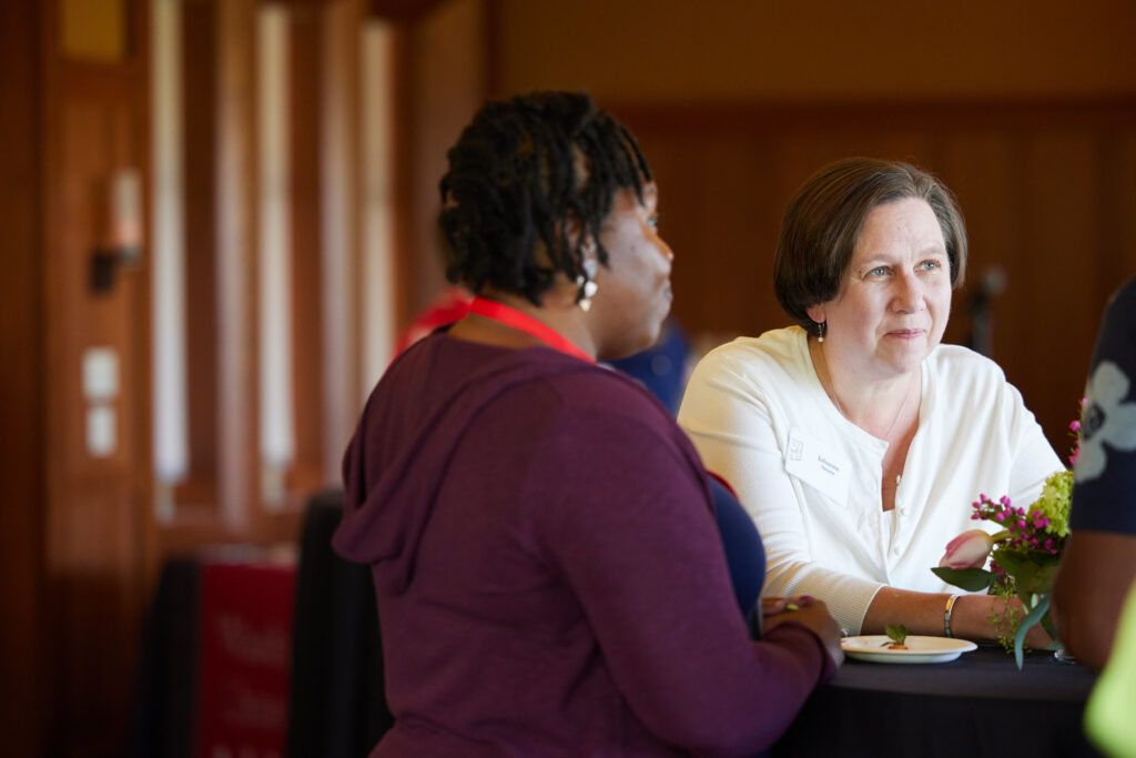 An alum listens to a presentation during the 2024 WashU Pride alumni network reception