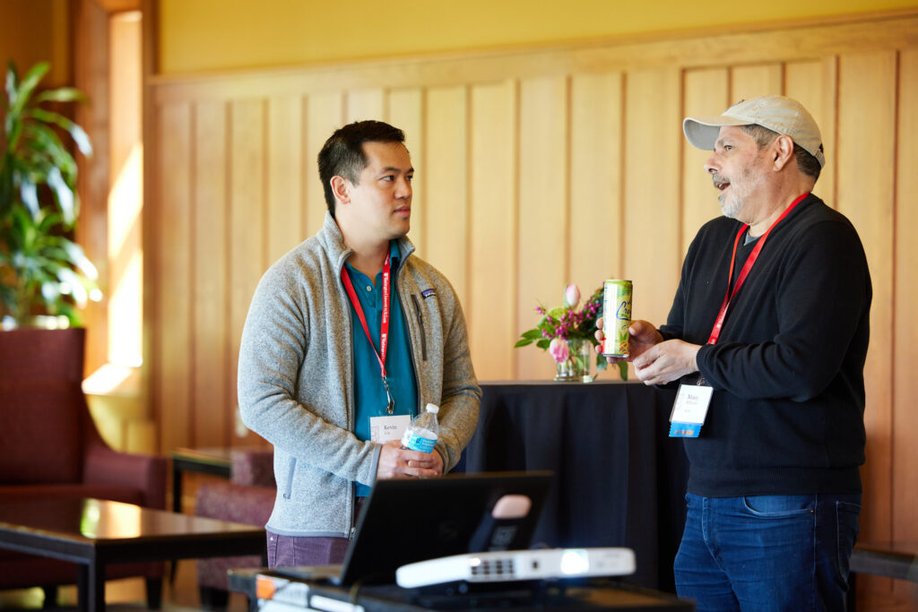 Two alums chat during the 2024 WashU Pride alumni network reception