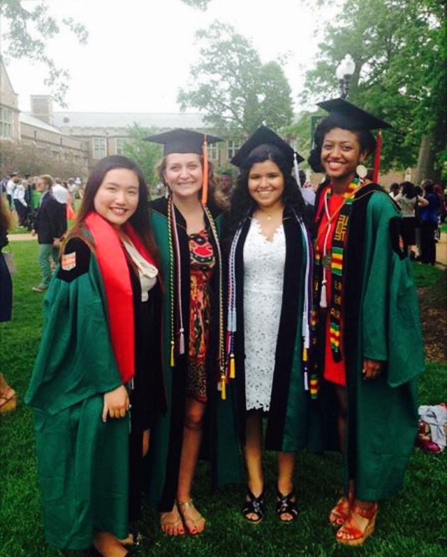 group of four women at commencement