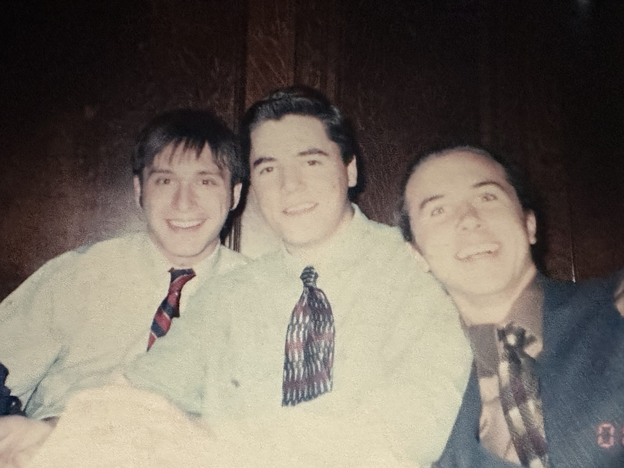 Three male students dressed up