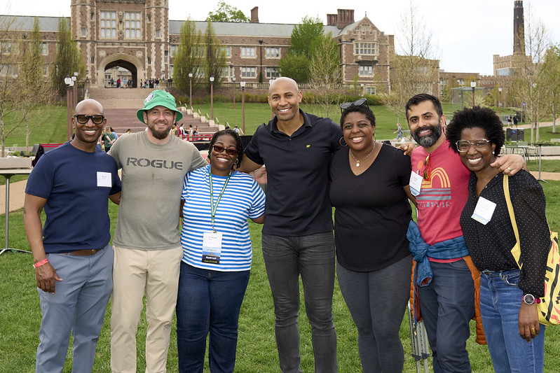 Alumni pose for a picture during Alumni Barbecue in Tisch Park