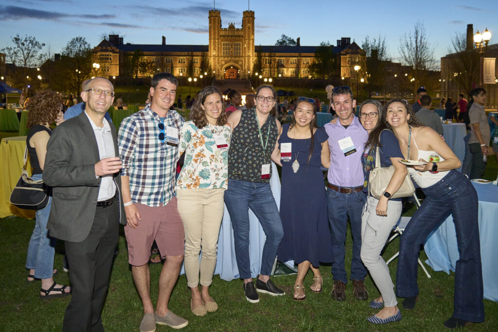 Alumni pose for a picture during WashU Reunion event