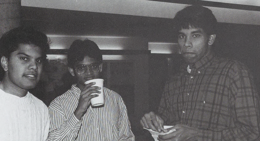 Alok Srivastava, AB '91, left, and friends enjoy food and drink at Diwali 1989.