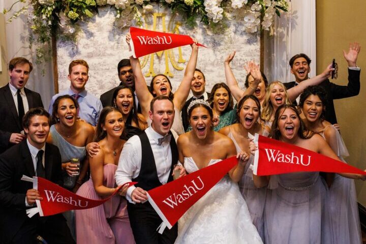 Wedding party with WashU banners