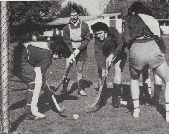 Black and white photo of women's field hockey team