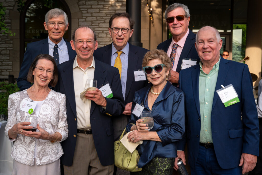 Attendees of Reunion at commencement dinner pose for a photo